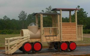 Train playground with cow catcher steps - Asheville Playgrounds