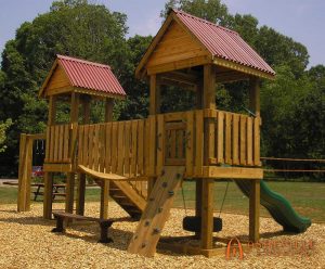 Two platform playground with wood bridge connecting the towers. Built for Bent Creek Community Park in Asheville, NC - Asheville Playgrounds